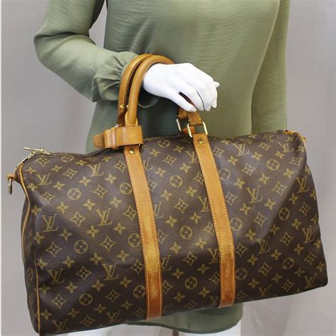 red louis vuitton duffle bag|Louis Vuitton duffle bag women's.